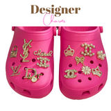 pink designer croc charms｜TikTok Search